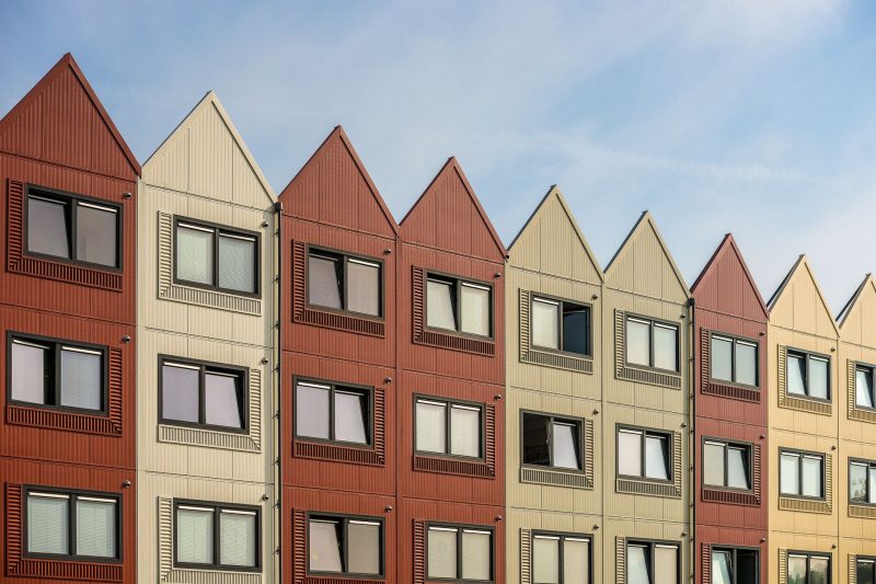 A vibrant row of gableroofed residential buildings