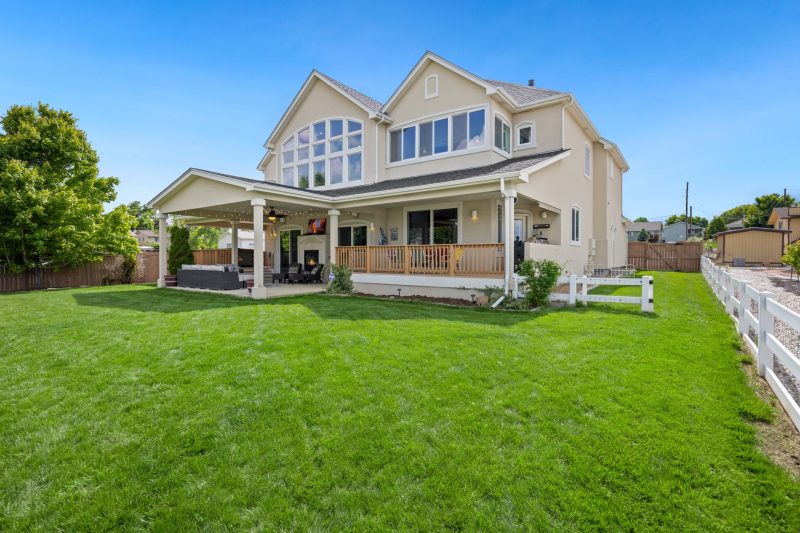 Beautiful two story suburban home with a large green lawn
